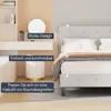 A bedroom scene with a bed and a vanity area. Produktbild-Vorschau