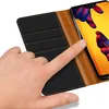 A hand is shown interacting with a phone case. Podgląd zdjęcia produktu