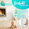A baby crawling in front of a fireplace with a baby gate installed. Anteprima dell’immagine prodotto