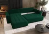 A modern living room with a green sectional sofa, fireplace, and coffee table. Voir les images du produit