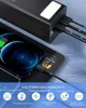 A black power bank is charging two smartphones, with protective features illustrated below. Produktbild-Vorschau
