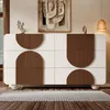 A modern dresser with decorative wooden accents is shown in a well-lit room with wooden floors and a rug. Voir les images du produit