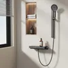 A modern bathroom shower area with a built-in niche, a shower system, and a window with blinds. Podgląd zdjęcia produktu