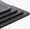 A close-up view of stacked cutting boards with colored dots. Anteprima dell’immagine prodotto