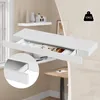 A white floating shelf with a drawer is shown, with a close-up inset of the drawer opening. The background shows a room with another shelf and a desk. Produktbild-Vorschau