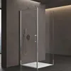 A modern shower cabin with glass doors and chrome fixtures in a minimalist bathroom setting. Voir les images du produit