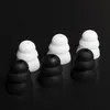 Six earbud tips, three white and three black, are arranged in two rows on a black background. Podgląd zdjęcia produktu