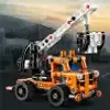 A LEGO Technic crane truck is shown in a studio setting with a blurred background. Anteprima dell’immagine prodotto