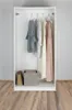 Inside a white wardrobe with clothes hanging on a rod and storage boxes below. Náhľad obrázku produktu
