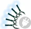 A string of white LED lights with green wires, shown diagonally against a white and light blue background. A circular icon with a white electrical plug symbol is superimposed on the right side of the image. Produktbild-Vorschau