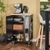 A kitchen cart with an espresso machine and other kitchen items, next to a bar stool. Produktbild-Vorschau