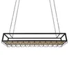 A black metal wine glass rack with a tan shelf, suspended by chains against a white background. Náhled obrázku produktu