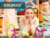 A woman and two children are playing with magnetic building blocks in a room with colorful storage bins. Náhled obrázku produktu