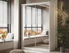 A modern bedroom with a large white wardrobe with mirrored doors, reflecting a window with blinds and a cushioned window seat. Produktbild-Vorschau