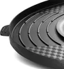 A close-up view of the interior of a black electric hot pot and grill. Voir les images du produit