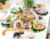 A table setting with safari-themed tableware, muffins, and animal figurines. Anteprima dell’immagine prodotto