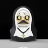 A close-up studio shot of a novelty rubber duck toy dressed as a nun. Podgląd zdjęcia produktu