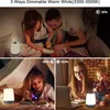 Collage of images showing a family with a baby, a girl reading, and a woman working on a laptop, all with a dimmable warm white lamp. Produktbild-Vorschau