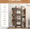 A vintage-style bookshelf with various decorative items and books on its shelves, presented in a room setting with a hint of a window and wall. Náhľad obrázku produktu