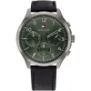 A close-up, front-facing studio shot of a Tommy Hilfiger men's watch with a green dial and black leather strap. Produktbild-Vorschau