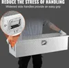 A person is carrying a silver aluminum toolbox. Náhľad obrázku produktu