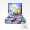A stack of children's bedding with a construction vehicle theme, including a pillow and folded duvet covers, presented on a white background. Produktbild-Vorschau