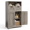 A tall, narrow cabinet with two doors and two drawers, made of wood-like material, is shown against a white background. The cabinet is open, revealing shelves with various items like bottles and towels. Produktbild-Vorschau
