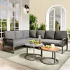An outdoor patio scene with a sectional sofa and coffee tables. Produktbild-Vorschau