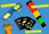 A collection of science-themed toys and cards for children, including a pair of spectral glasses, a small telescope, and several cards with illustrations of aliens and scientific concepts. Náhled obrázku produktu