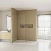 A modern bathroom with a walk-in shower, vanity, and window. Produktbild-Vorschau