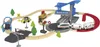 A toy train set with tracks, a station, trains, a car, and trees. Podgląd zdjęcia produktu
