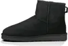 A single black Ugg boot is shown from the side against a white background. Voir les images du produit