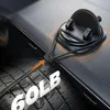 A car phone holder is shown attached to a car's dashboard, with a tire in the foreground to demonstrate strength. Náhled obrázku produktu