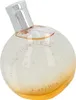 A perfume bottle with a silver cap and a clear, round body decorated with stars and text. Anteprima dell’immagine prodotto
