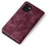 A burgundy flip case for an iPhone 13 is shown on a white background. Produktbild-Vorschau