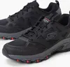 A pair of black Skechers trail running shoes on a white background. Produktbild-Vorschau