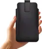 A hand holding a black smartphone pouch with red stitching. Produktbild-Vorschau