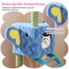 A blue elephant-shaped cat house with a cat peeking out of a window, surrounded by decorative elements and text. Podgląd zdjęcia produktu