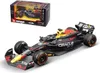 A die-cast model of a Red Bull Formula 1 car is displayed on a white background, with its packaging shown in the upper left corner. Náhled obrázku produktu