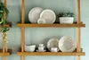 A shelf with Villeroy & Boch dinnerware. Produktbild-Vorschau