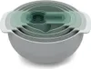 A set of nesting mixing bowls and measuring cups. Produktbild-Vorschau