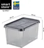 A clear, well-lit image of a transparent storage box with a gray lid, showing dimensions and branding. Produktbild-Vorschau