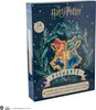 A Harry Potter advent calendar with the Hogwarts crest and holiday decorations. Náhled obrázku produktu