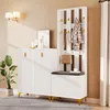 A white entryway furniture set with a coat rack, bench, and storage cabinets, decorated with a plant and artwork. Anteprima dell’immagine prodotto
