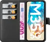 A black wallet-style phone case with a Samsung Galaxy M35 phone inside, showing the screen and the case's card slots and a banknote. Produktbild-Vorschau