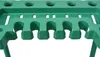 A close-up view of a green plastic garden tool rack. Podgląd zdjęcia produktu
