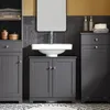 A bathroom vanity with a sink and cabinets. Produktbild-Vorschau