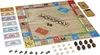 A Monopoly board game with a wooden design, including money, dice, and game pieces. Produktbild-Vorschau