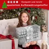 A young girl is holding a clear plastic box filled with silver Christmas ornaments in front of a decorated Christmas tree. There are also gift boxes and a nutcracker figure in the scene. Voir les images du produit