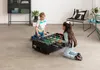Two children playing foosball in a room. Anteprima dell’immagine prodotto